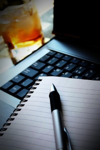 Computer with Pen and Paper